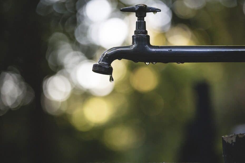 Outdoor tap faucet drips with water