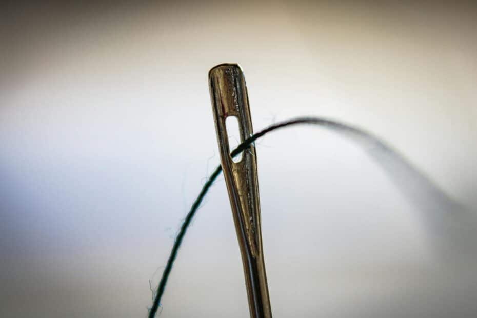 thread passing through eye of needle