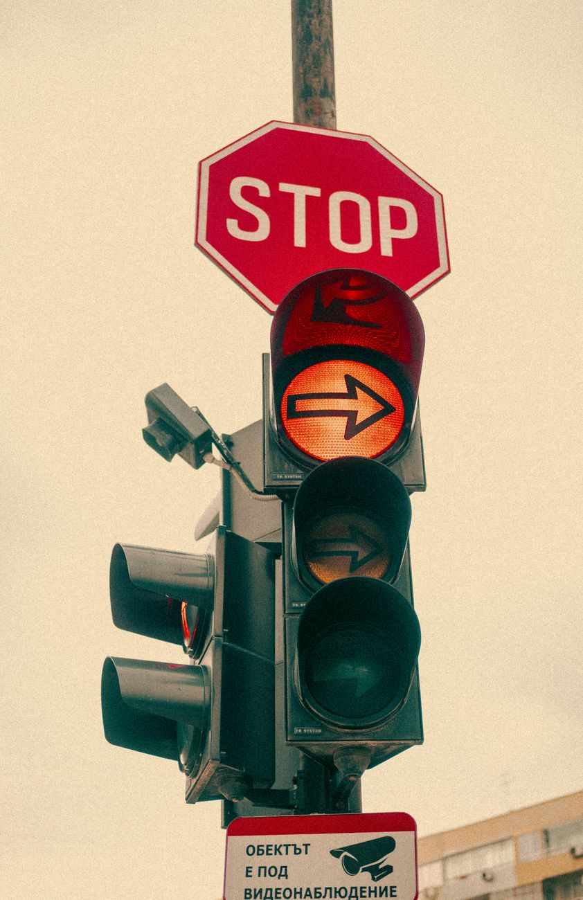 vintage traffic light with stop sign